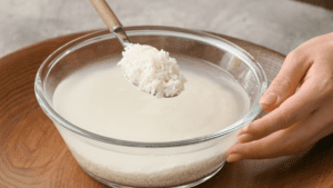 Rice Water for Hair: The Secret to Shiny, Silky Strands Do you have dry, damaged hair that is in need of some TLC? If so, then you should definitely try using rice water! Rice water is a natural remedy that has been used for centuries to improve the condition of hair. It is packed with nutrients that help strengthen and moisturize strands, leaving them looking shiny and silky. In this blog post, we will discuss how to use rice water for hair, as well as the benefits it can provide. So if you're ready to get your hair back to its healthy state, keep reading! What is Rice Water? Rice water has been used as a beauty treatment in Asia for centuries. Rice water contains proteins and vitamins that can help to strengthen hair and promote growth. In addition, rice water can help to smooth the cuticle, giving hair a shiny and healthy appearance. Rice water is easy to prepare at home, and it can be used as a conditioner, shampoo or leave-in treatment. Why Rice Water is it Good for Your Hair? Rice water is the water that is left over after cooking rice. It is rich in nutrients like vitamins B and C, minerals like potassium and magnesium, and has a high level of starch. These nutrients can be beneficial for your hair, making it shinier, stronger and smoother. Rice water can also help to improve scalp health by reducing inflammation and stimulating circulation. If you are looking for a natural way to boost your hair health, then rice water may be worth a try. Just be sure to check with your doctor first if you have any concerns about using it. How to Make Rice Water for Your hair? Rice water has been used for centuries as a beauty treatment for hair. And it's no wonder why – rice is packed with nutrients that are essential for healthy hair. Rice water can help to strengthen hair, add shine and make it more manageable. Plus, it's incredibly easy to make! Here's how: 1. Rinse a cup of rice in cold water. 2. Add the rinsed rice to a pot of water and bring to a boil. 3. Reduce the heat and let the rice simmer for 15 minutes. 4. Once the rice is cooked, strain it and collect the water in a bowl. 5. Let the water cool, then use it as a final rinse after shampooing and conditioning your hair. Rice water can be stored in the fridge for up to a week, so you can make a big batch and use it over time. Just be sure to give it a good shake before each use. How to Use Rice Water For Your Hair: step by step Here is a step by step guide on how to use rice water for your hair: 1. First, rinse a cup of rice in water to remove any dirt or impurities. 2. Then, boil the rice in 2 cups of water for about 15 minutes. 3. After the rice has finished boiling, strain out the rice and collect the water in a bowl. 4. Allow the water to cool before using it on your hair. 5. To use it as a shampoo, massage the rice water into your scalp and then rinse it out with clean water. 6. To use it as a conditioner, apply the rice water to your wet hair after shampooing and then rinse it out with clean water. 7. To use it as a Leave-in treatment, apply the rice water to your damp hair and then style as usual. The rice water can also be stored in an airtight container and refrigerated for up to 2 weeks. Three Ways to Use Rice Water for Hair: 1. As a leave-in conditioner: Apply rice water to damp hair and comb through. Do not rinse out. Style as usual. 2. As a daily rinse: Rinse your hair with rice water after shampooing and conditioning. Rinse out with cool water. 3. As a deep conditioning treatment: Apply rice water to damp hair and cover with a shower cap or plastic bag. Leave on for 20-30 minutes, then shampoo and condition as usual. Rice water can help improve the appearance of your hair by making it shinier, smoother, and more manageable. It can also help to strengthen your hair and prevent damage from heat styling and coloring. So if you’re looking for lustrous locks, give rice water a try! The Benefits of Using Rice Water for Your Hair Rice is a natural source of vitamins and minerals, including vitamin B, which is essential for healthy hair growth. Rice water also contains inositol, a compound that helps to repair damaged hair follicles and promote new growth. In addition, rice water is a natural conditioner that can help to make your hair softer and shinier. Of course, you don't need to live in Asia to benefit from this ancient beauty secret - you can easily make your own rice water at home. Simply boil some rice in water, then let it cool before shampooing as usual. You'll notice a difference in the condition of your hair after just a few uses. FAQs about Rice Water for Hair 1. What are the benefits of rice water for hair? Rice water can help to strengthen hair, minimize split ends, add shine, and act as a natural conditioner or leave-in treatment. 2. How do I make rice water? Simply boil rice in water, strain out the rice, and voila – you've got rice water! You can use it immediately or store it in the fridge for up to a week. Just be sure to give it a good shake before each use. 3. Will rice water work on all hair types? Yes! Rice water is suitable for all hair types, including straight, wavy, curly, and coiled hair. 4. How often should I use rice water on my hair? You can use rice water as often as you like – we recommend 2-3 times per week for best results. Conclusion Try rice water for hair next time you want to give your strands a boost of shine and silkiness. This natural, inexpensive method has been used for centuries in Asia and is only now starting to gain popularity in the West. If you give it a try, let us know how it worked for you!