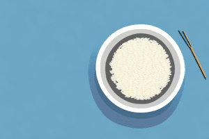 A bowl of uncooked rice with a smartphone placed inside