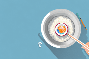 A cell phone submerged in a bowl of uncooked rice