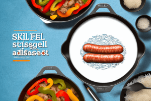 A skillet filled with cooked sausage and bell peppers