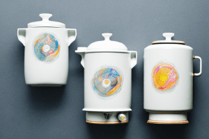 Two ceramic rice cookers side-by-side