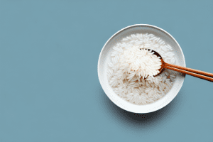 A bowl of steaming rice milk with a spoon in it