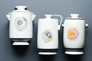 Two ceramic rice cookers side-by-side